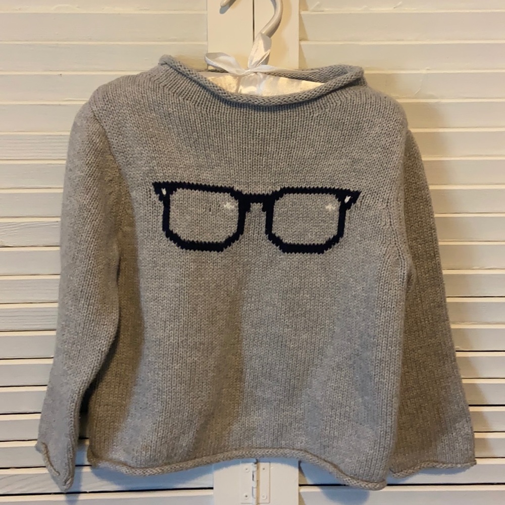 Grey sweater with glasses
